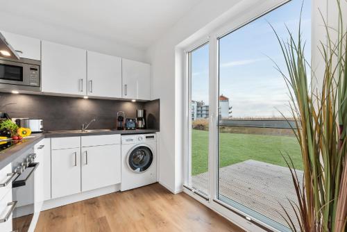 dapur, Ferienhaus Kaptains Strandhuus Olpenitz in Olpenitz