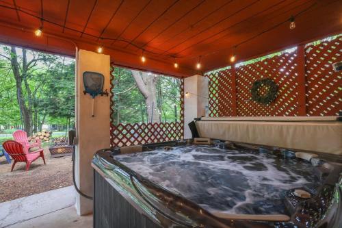 Gloria's Hot Tub Game Room Fire Pit in Blakeslee 