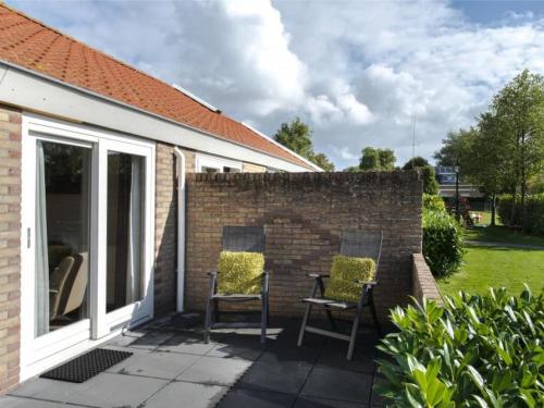 Holiday home in Nes with swimming pool