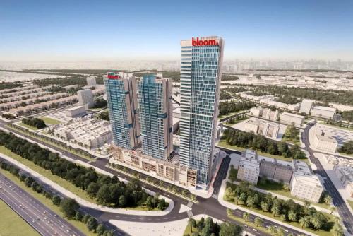 Modern Fully Furnished Apartment in Bloom Tower B JVC - Easy Access to JBR, Circle Mall & Dubai Hills Mall, Dubái