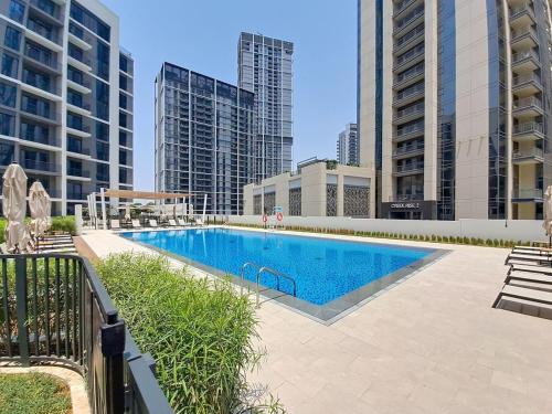 Vacationer l Chic 2 Bedroom l Prime Location in Creek Harbour l Pool View, Dubai (foto 2)