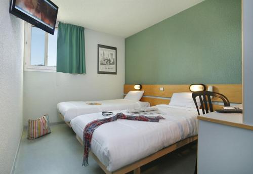 Chambre avec 2 lits