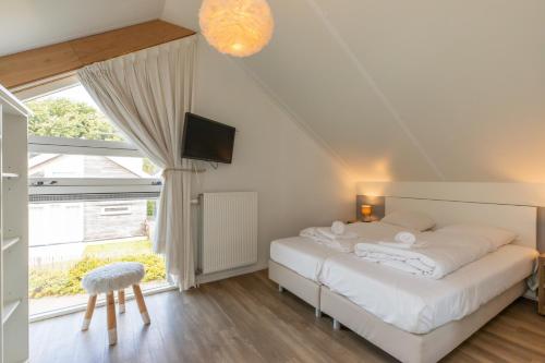 Welcome in - Zonnedorp Kavel 10 Renesse | Villa nabij het Strand & met Ruime Tuin, Renesse (foto 8)