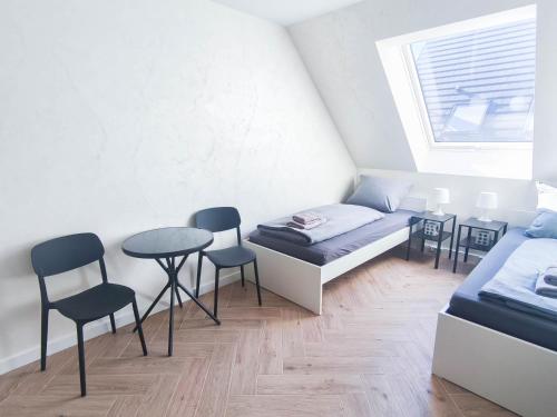 ALFA Stuttgart Doppelzimmer Teeküche Porsche Bosch l Gemeinschaftsbad WIFI SmartTV l Double room with kitchenette and shared bathroom BS21A8, Штутгарт (фото 6)