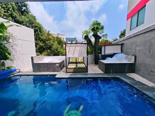 Loft lujo estilo y diseño, alberca climatizada y cama de alberca, Cuernavaca somos los únicos en ofrecerte 2 jacuzzis para tu uso personal y exclusivo con agua caliente y sistema de hidromasaje tipo Spa, terraza privada y asador de carbon
