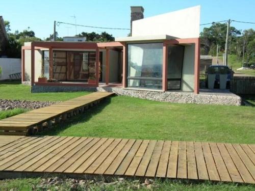 House with garden on the beach
