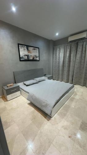 Modern Cozy Apartment with Elegant Gray Design & Smart Lighting