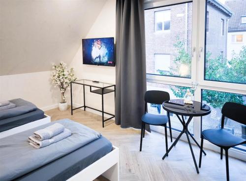 ALFA Stuttgart Doppelzimmer Teeküche Porsche Bosch l Gemeinschaftsbad WIFI SmartTV l Double room with kitchenette and shared bathroom BS21A9, Stuttgart (photo 2)