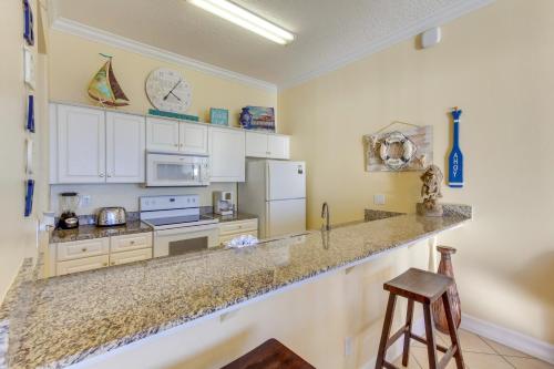 Beachfront Condo with Resort Amenities and View! - image 10