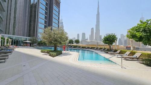Vogue Downtown Stylish two Bedroom Apartment with Full Burj Khalifa View from Balcony and full amenities - Steps away From Dubai Mall and Burj Khalifa, Dubái (foto 3)