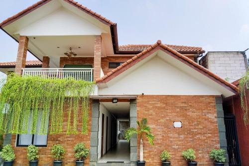 Entrance, Urbanview DeJati House Jatikramat Bekasi in Pondok Gede