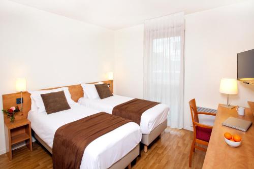B&B Rennes - Séjours & Affaires Rennes Longs Champs - Bed and Breakfast Rennes
