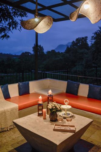 Balcony/terrace, SaffronStays Ira - 3BR vegetarian pet-friendly villa with pool, gazebo & terrace glasshouse in Karja in Shedung