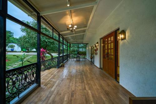 View, SaffronStays Ira - 3BR vegetarian pet-friendly villa with pool, gazebo & terrace glasshouse in Karja in Shedung