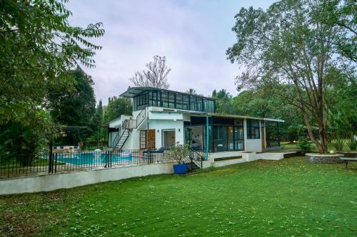 Exterior view, SaffronStays Ira - 3BR vegetarian pet-friendly villa with pool, gazebo & terrace glasshouse in Karja in Shedung