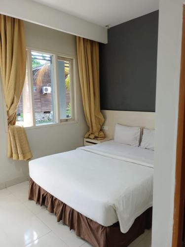 Hotel Cavery Beach in Sigunturmuda