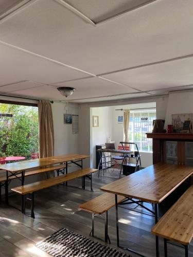 Koplietošanas atpūtas telpa ar TV, Patagon Backpackers in Kojaikve