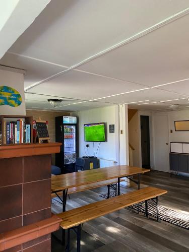 Koplietošanas atpūtas telpa ar TV, Patagon Backpackers in Kojaikve