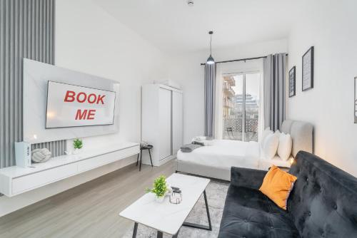 StayShort - Outstanding Studio in JVC with Balcony, Дубай