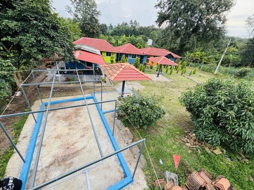 Exterior view, COORG SUNRISE COTTAGES in Coorg