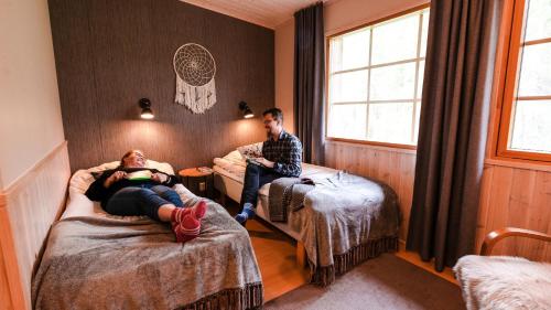Isokenkäisten Klubi - Wilderness Lodge - Hôtel - Kiviperä