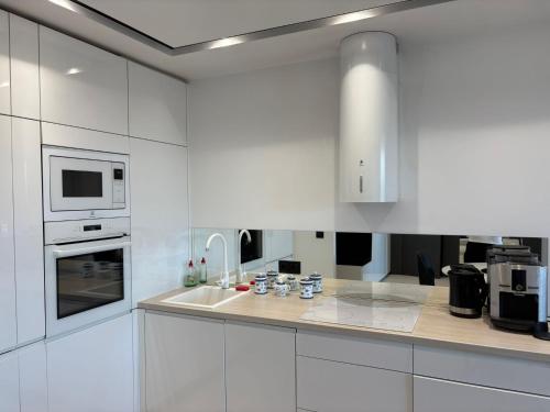 Beautiful apartment with air conditioning, balcony and underground garage, Cracovie (photo 4)