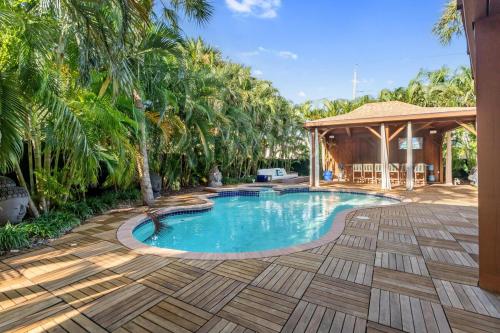 Poolside Paradise Steps from the Sand