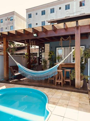 Studio in Joinville, piscina - Pet Friendly