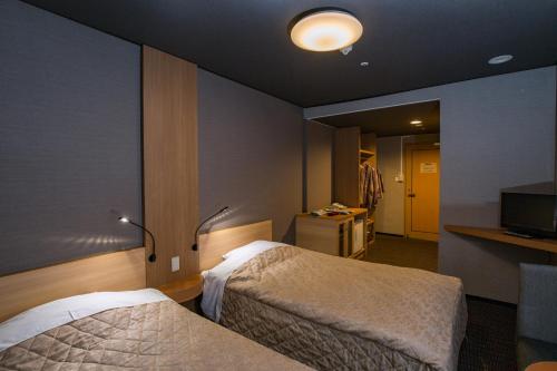 Economy Twin Room with Shared Bathroom - Non-Smoking