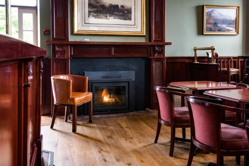 Koplietošanas atpūtas telpa ar TV, The Inveraray Inn, BW Signature Collection in Saint Catherines