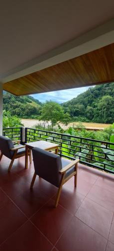 My village river side in Nong Khiaw