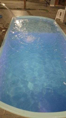 Peldbaseins, Casa com piscina e espaço gourmet a 30m da praia! (Casa com piscina e espaco gourmet a 30m da praia!) in Alkobaka