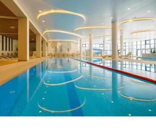 Kołobrzeg Apartamenty Polanki AQUA z Bezpłatnym Basenem, Bawialnią i Fitness – khách sạn tại Radzikowo