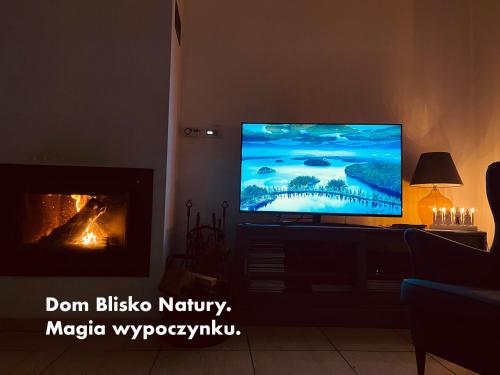 Koplietošanas atpūtas telpa ar TV, Dom Blisko Natury Boszkowo Letnisko A in Boszkowo- Letnisko