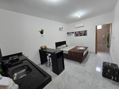 ห้องส่วนกลางสำหรับนั่งเล่น/ดูทีวี, Flat completo 15 com ar condicionado e colchão confortável (Flat completo 15 com ar condicionado e colchao confortavel) in อะปาร์เรซิดา เดโกยาเนีย