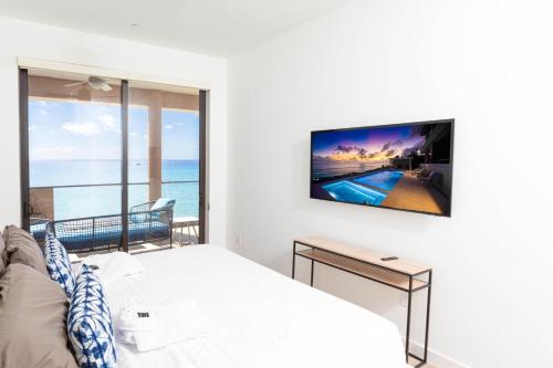 SeaDreams 4 - Luxury Condo with Shared Pool, Hot Tub, Rooftop Lounge, West Bay (Foto 10)