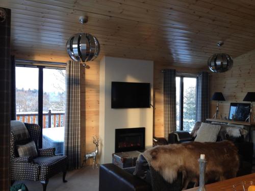 Sòghail Luxury Lodge and Balquhidder Mhor with Hot Tub (Soghail Luxury Lodge and Balquhidder Mhor with Hot Tub) in คิลลิ้ง