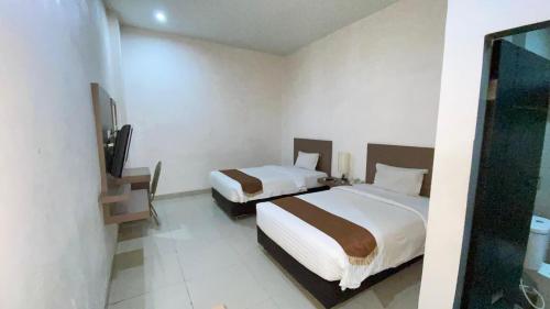 Saka Hotel Medan Room Type - Superior Twin Room