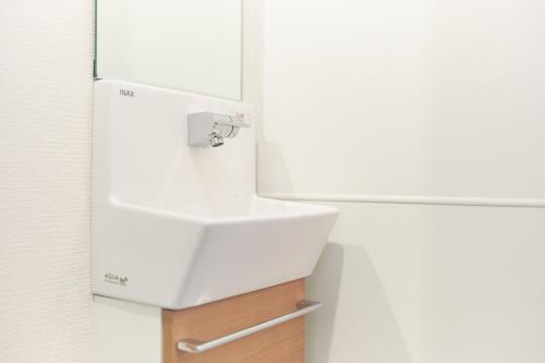 Zenith Shinjuku Hinoki Building B by Tranova