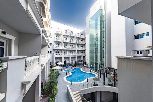 Escape24 Spacious 1BR with Pool View, JVC, Dubai