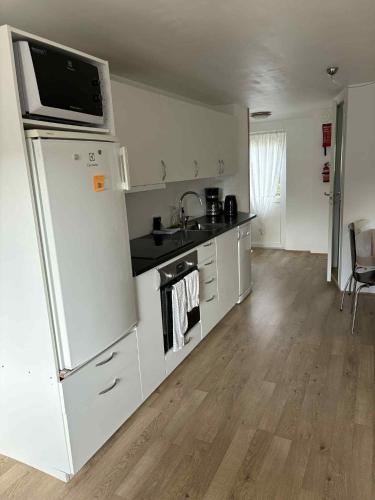 מטבח, Midbrekkan apartment in Trongisvágur