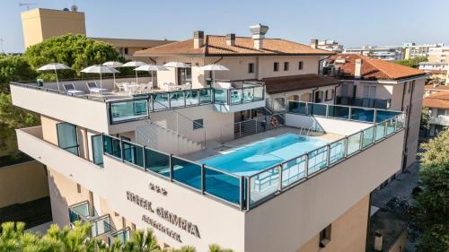 Exterior view, Hotel Olimpia - Family Suite Aparthotel in Bibione
