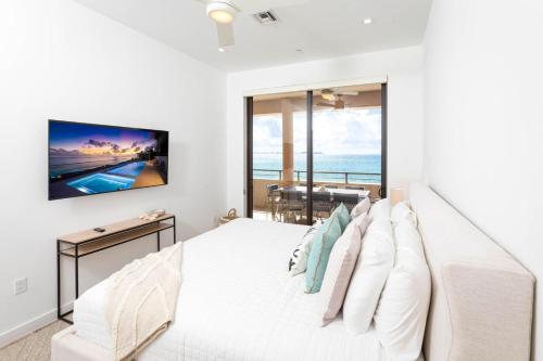 SeaDreams 1 - Luxury Condo with Shared Pool, Hot Tub, Rooftop Lounge, West Bay (foto 7)