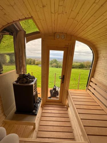 Valley view cabin in the woods on a farm in Ballinasloe