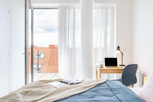 Prague Days - Family Friendly Two-Bedroom Apartment with AC Garage and Terrace in Holešovice - image 7
