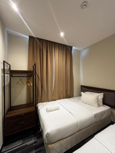 iBilik Hotel - KLIA 1 KLIA 2, Sepang Room Type - Deluxe Twin Room