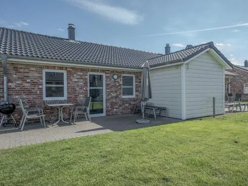 Ferienhaus Chaplin mit Kamin und eingezäuntem Garten in Dagebüll, Deutschland