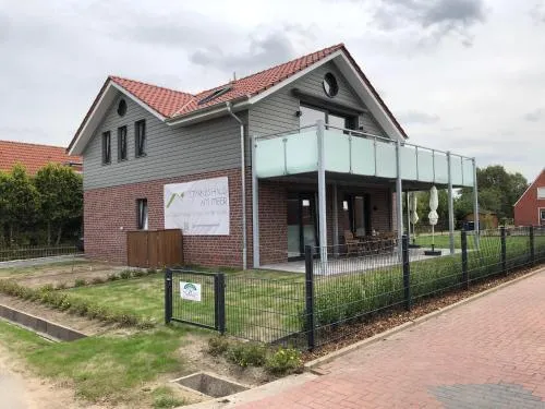 Starkes Haus am Meer in Neuharlingersiel, Deutschland