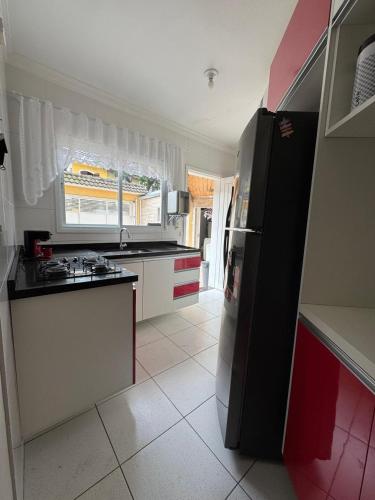 Casa em São Paulo 2 suítes e vaga de garagem (Casa em Sao Paulo 2 suites e vaga de garagem) in シダーデ アデマル