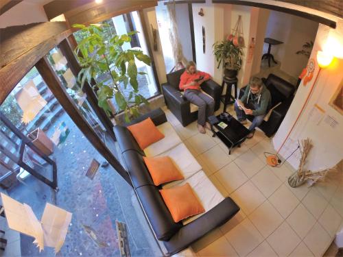ห้องส่วนกลางสำหรับนั่งเล่น/ดูทีวี, Hostal L'Auberge Inn in กวนกากาเย